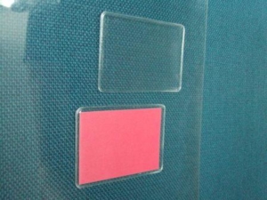 Self-adhesive pocket for cars windshields for hotels and campings guests in hf welded PVC