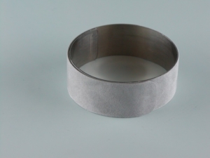 Hf welded coating of a spring band for fabrics