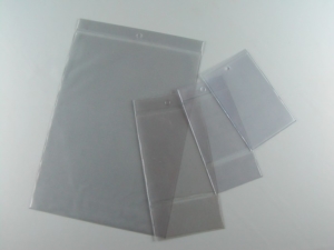 Label holder bags with perforation, in hf welded PVC