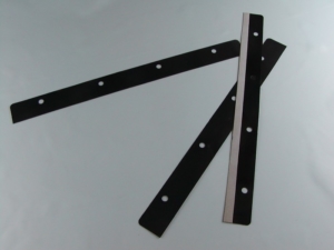 Self-adhesive strips in plastic material with perforation